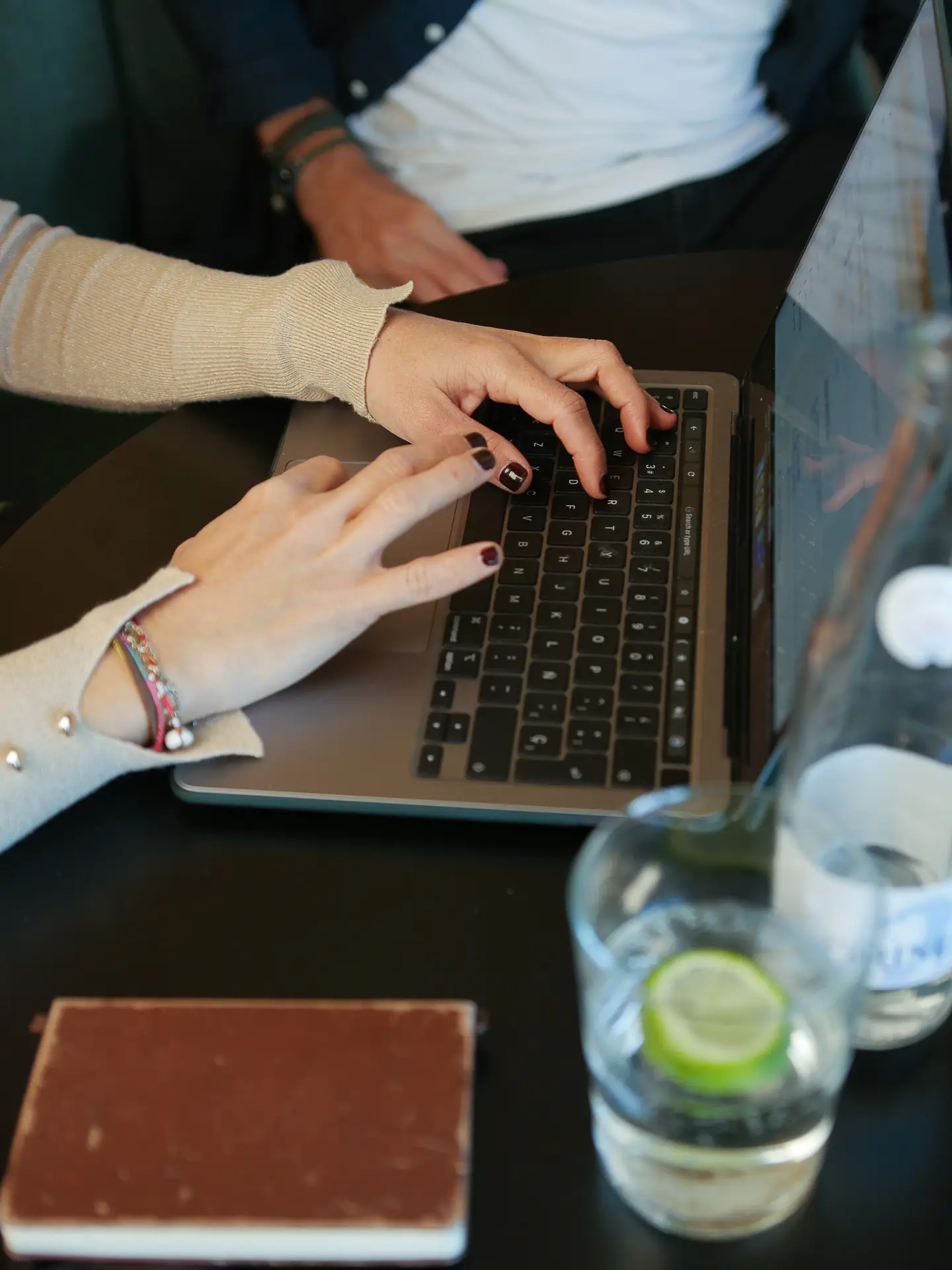 Monica Ferrer developing a digital marketing strategy for lawyers, working hands-on from her laptop.